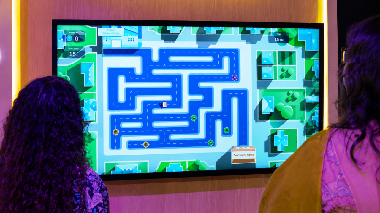 Amazon interactive gamified delivery experience using a large digital display